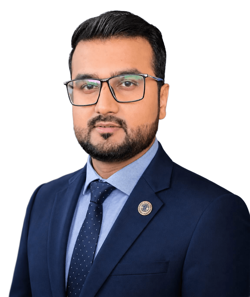 Dr Hafiz Muheet Farooq in a navy suit